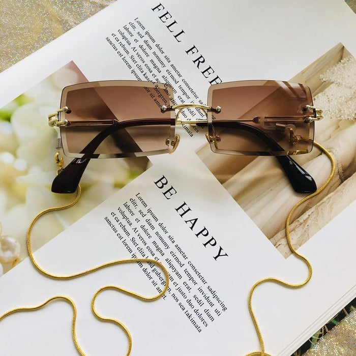 Fashion Rimless  Women Trendy Small Rectangle Sunglasses With High Quality metal frame And UV400 Protection