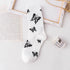 Cartoon socks cute bow print white black calcetines Women's Novelty Socks Crew Fun Funky fall fashion Casual Cotton Dress Socks - ALLURELATION - black and white socks, butterfly socks, cotton socks, cute bow print socks, funny socks, novelty socks, socks, socks for women, womens socks - Stevvex.com