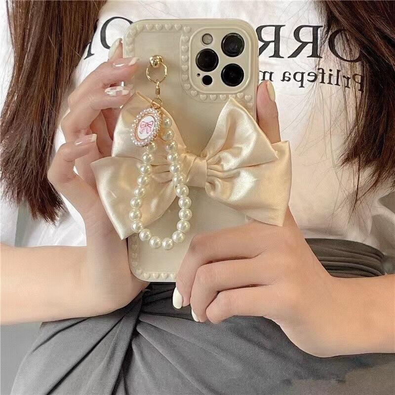 Pearl Bracelet With Fabric Bow Phone Case For iphone 13 12 11 13 Pro Max Mini X XR XS Max 6 S 7 8 Plus Soft Phone Shell Handmade Bow Pearl Bracelet Clear Laser Heart Phone Case for Women